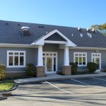 building and front entrance of Oral and Dental Implants surgery practice in Cranberry Township PA